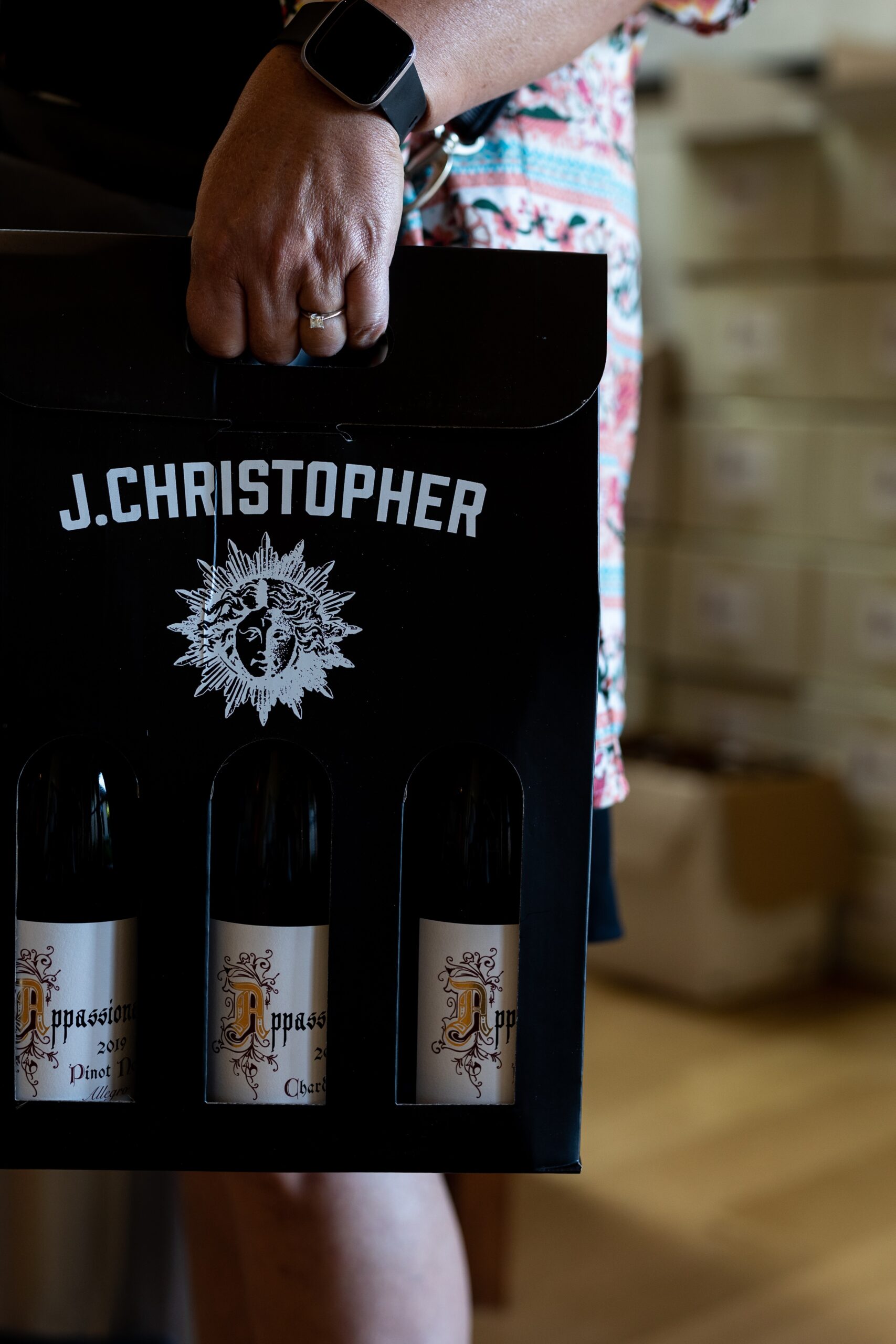 JC box with wine